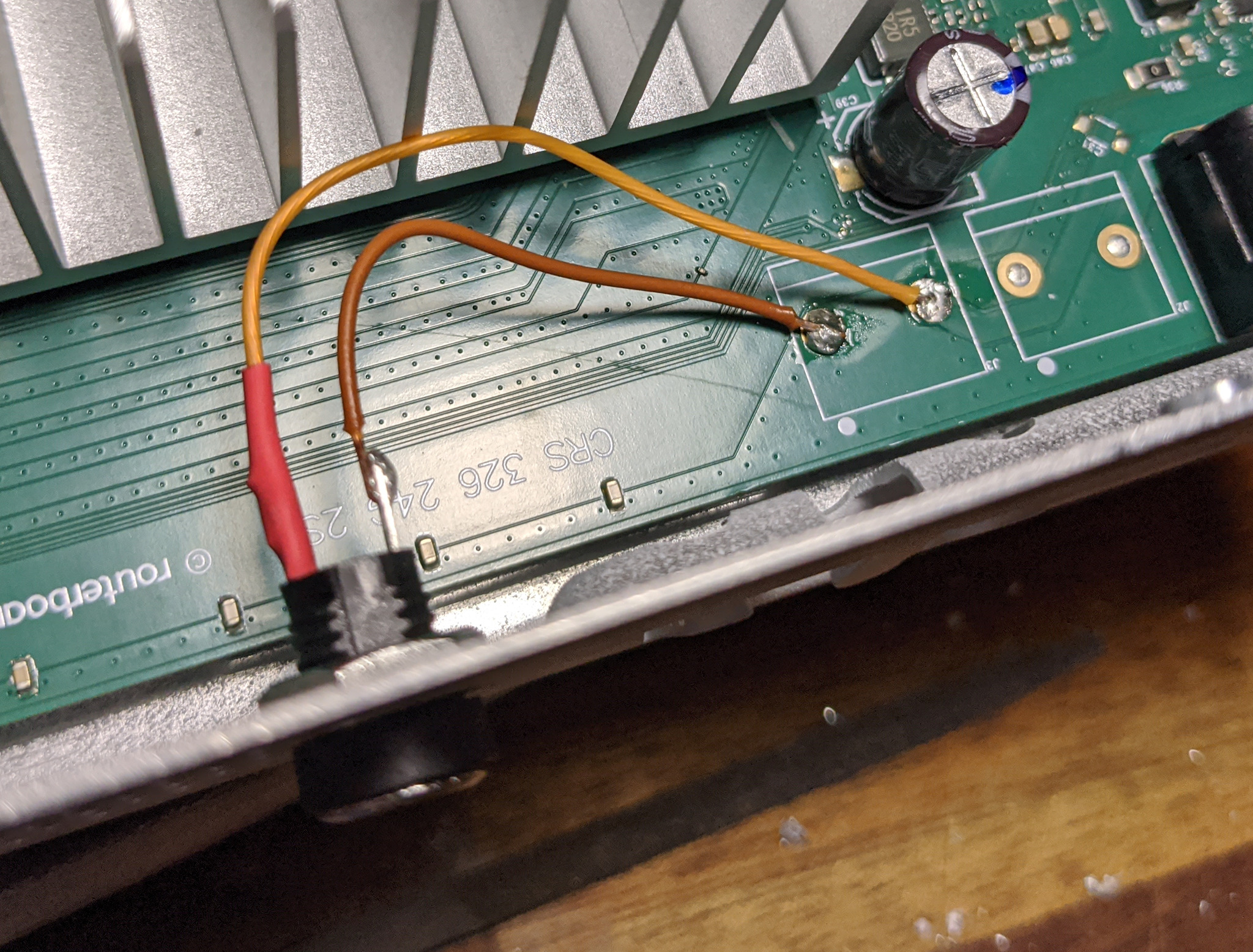 power socket soldered to the board with wires